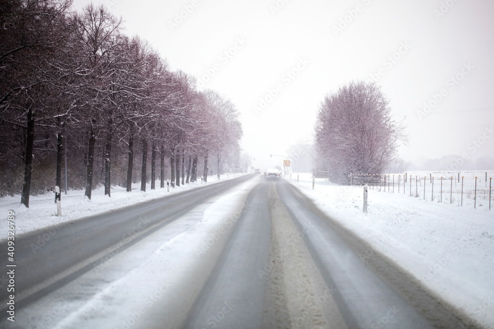 travel germany and bavaria, snow covered street at daytime with traffic