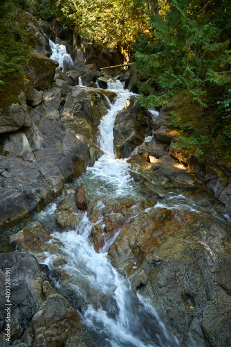 Pacific Northwest Deception Falls Washington vertical. Deception Falls in the Cascade Mountains. Washington State  USA.  