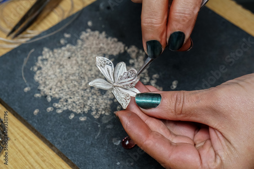 Process of making silver filigree. Production and making manufac photo