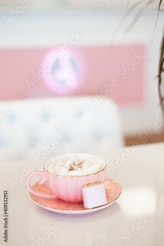 A cup of cappuccino for a client in a beauty salon
