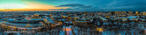 Air panorama Odessa Ukraine with Main train station and urbane winter landscape. Drone footage  evening and cloudy sky..