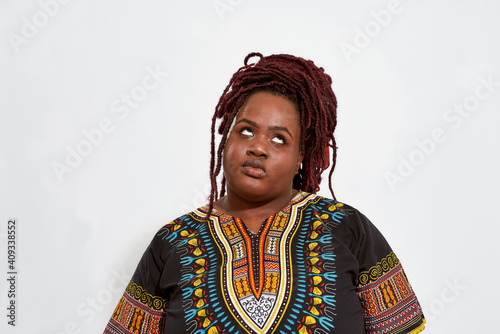 Photography Plump young african american woman rolling her eyes