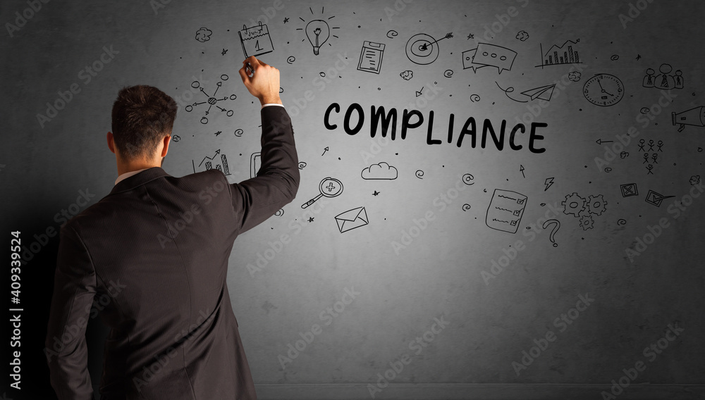 businessman drawing a creative idea sketch with COMPLIANCE inscription, business strategy concept businessman drawing a creative idea sketch with COMPLIANCE inscription, business strategy concept