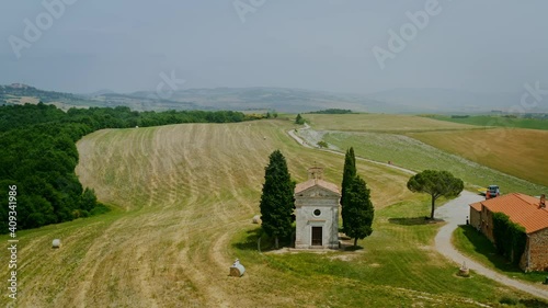 Vitaleta Chapel aerial view in the wonderful valley of Orcia, Tuscany. Drone footage.