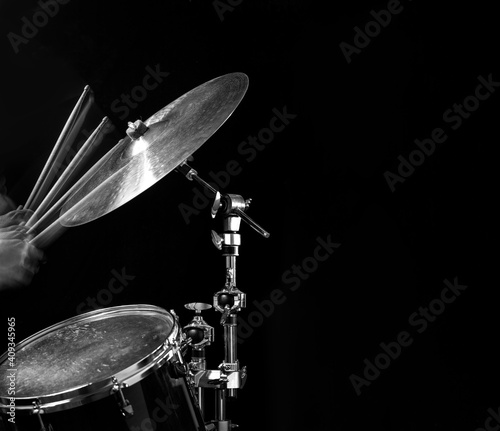 Canvas Print Stroboscopic drummer hitting cymbals with drum sticks