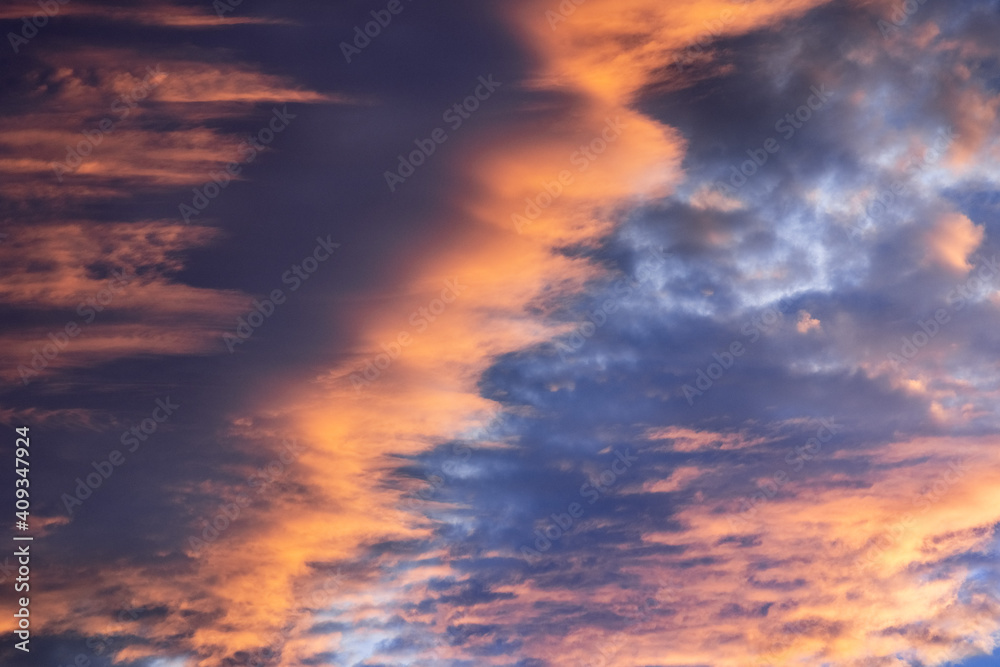 Close up of a layer of brightly colored sunset clouds