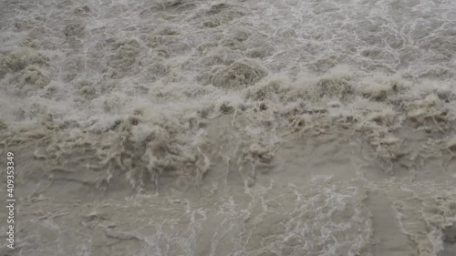 White waters of the Rimac river in after a rain in Lima, Peru photo