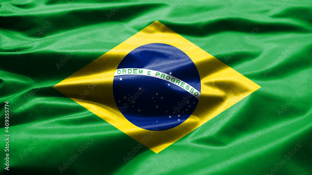 Fototapeta premium Brazilian flag waving in the wind. Close up of Brazil banner blowing smooth silk