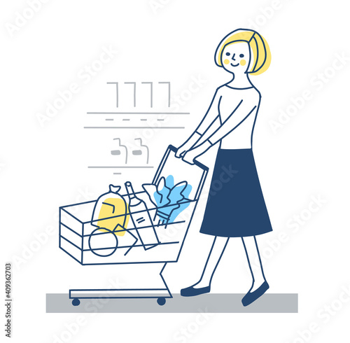 ショッピングカートを押して買い物をする女性