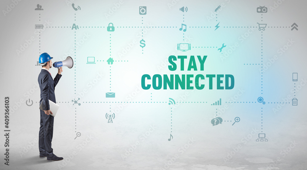 Engineer working on a new social media platform with STAY CONNECTED inscription concept