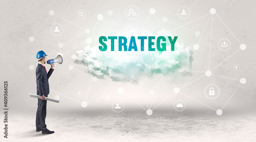 Engineer working on a social media concept with STRATEGY inscription Engineer working on a social media concept with STRATEGY inscription