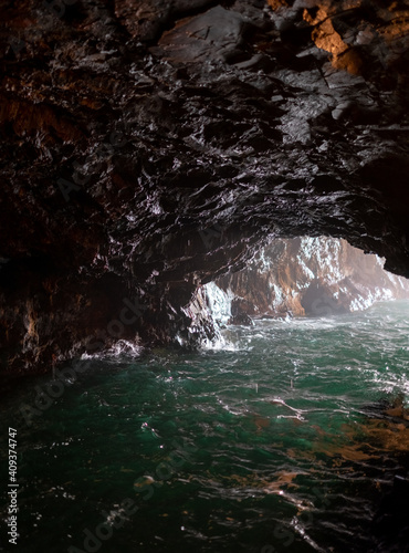 Cave inside rocky cliff formations at Sandanbeki Cliff in Shirahama, Wakayama Prefecture, Japan.
