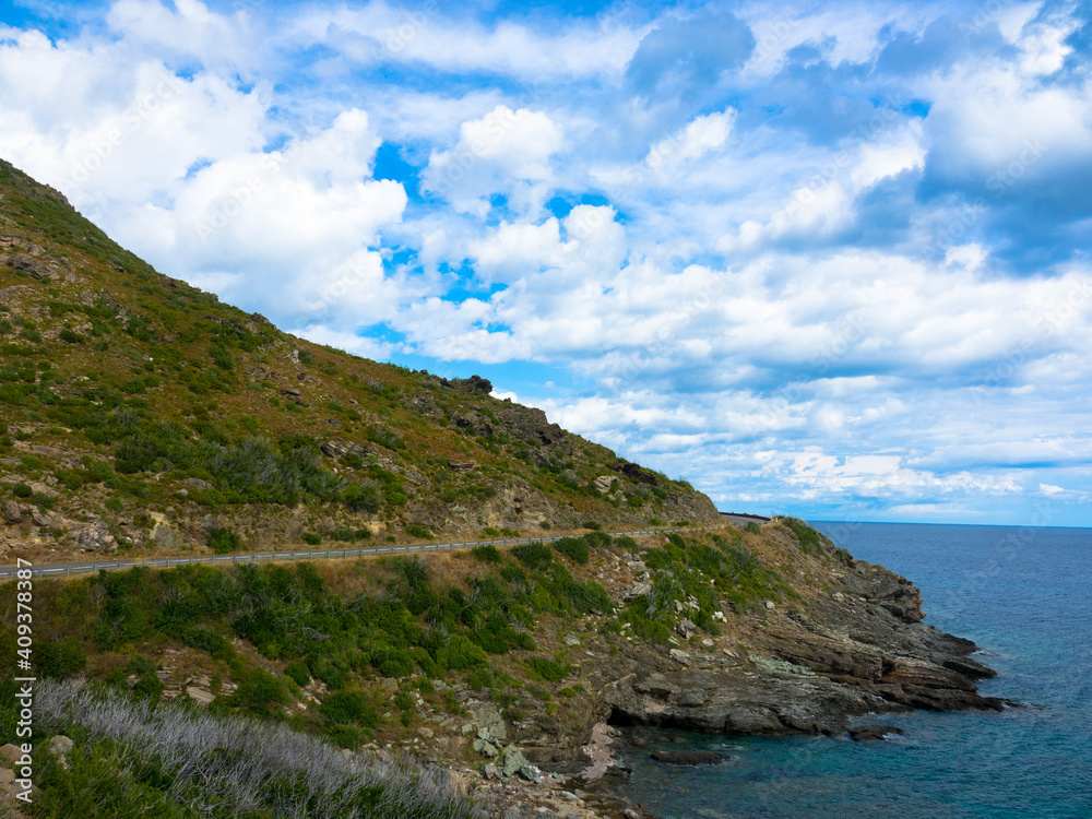 Panorama view of the rocky coastline and mediterranean sea, Cap Corse, Corsica, France. Tourism and vacations concept. Panorama view of the rocky coastline and mediterranean sea, Cap Corse, Corsica, France. Tourism and vacations concept.