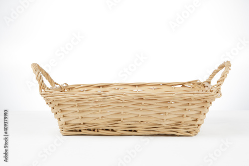 a rattan basket isolated on white background