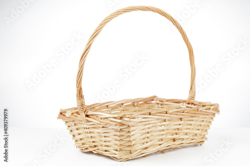 a rattan basket isolated on white background