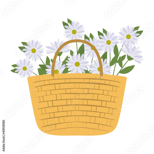 picnic basket with a bundle of a white flower