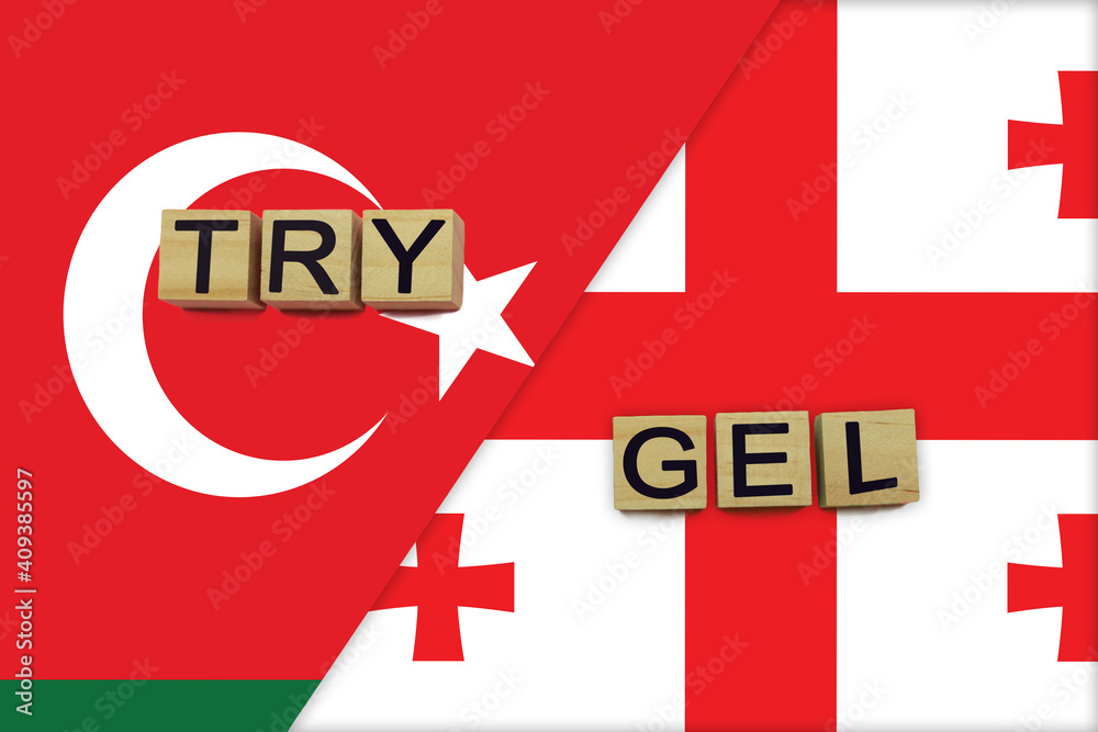 Turkey and Georgia currencies codes on national flags background Turkey and Georgia currencies codes on national flags background