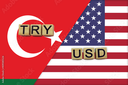 Turkey and USA currencies codes on national flags background