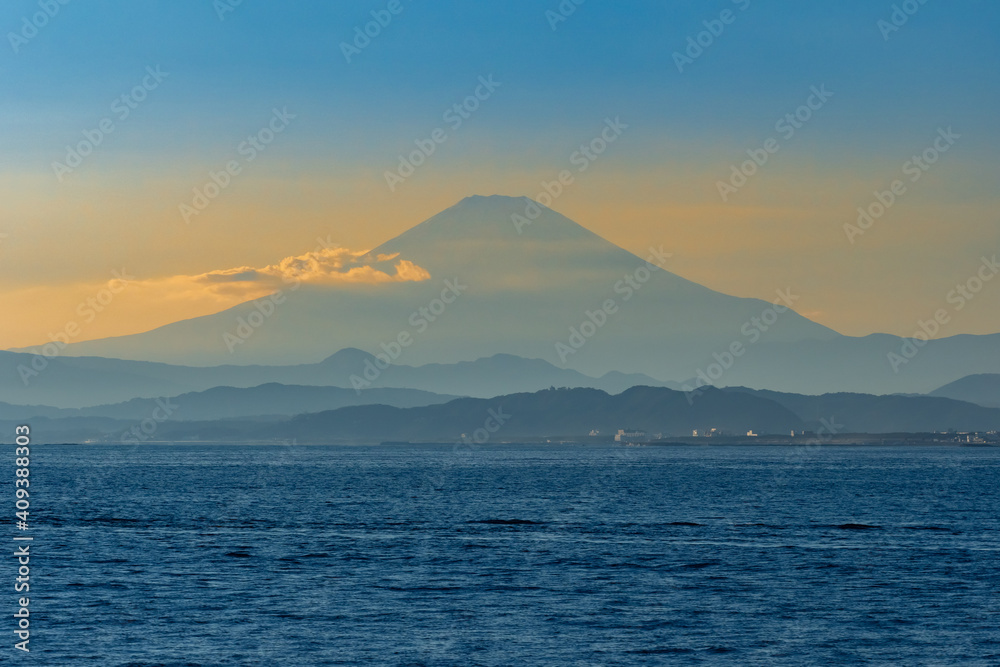 Japan. Kawaguchiko. Mount Fuji. The Volcano Fuji in the fog. Mountain view from lake Kawaguchiko. Travel to the reserves of Japan. Landscapes Of East Asia.Tourism in Japan. Japanese natural landscape