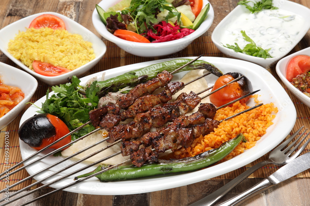 lamb liver skewers served with grilled tomato and pepper lamb liver skewers served with grilled tomato and pepper