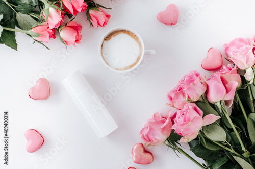 White skincare bottle with coffee cup for a background
