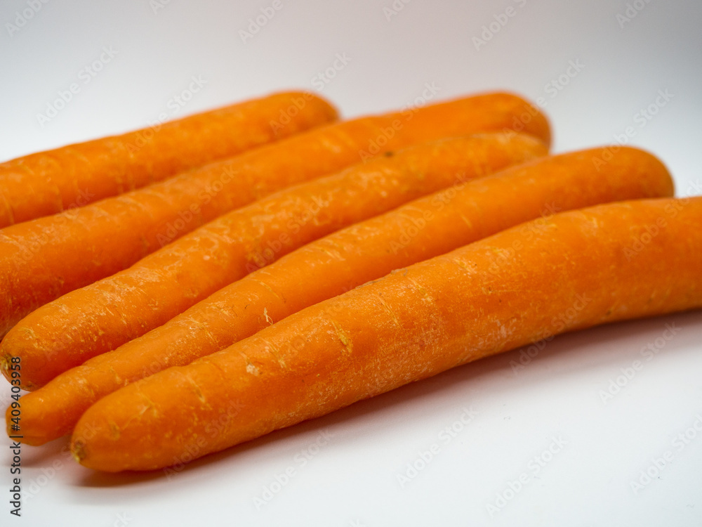 Bunch of carrots on a white background Bunch of carrots on a white background