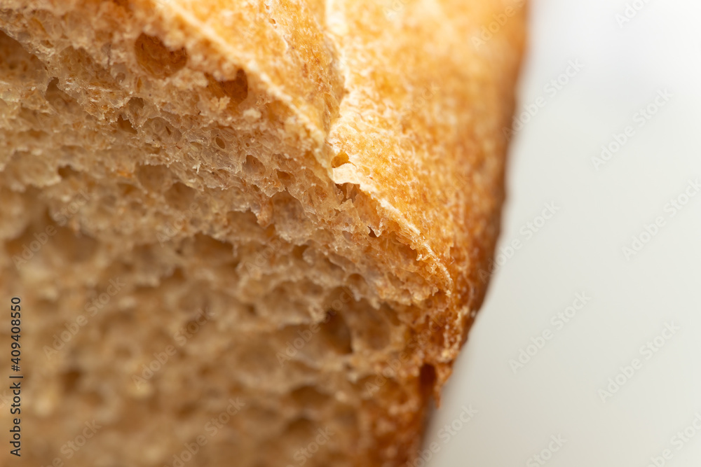 Wheat-rye bread with bran, fresh, sliced.