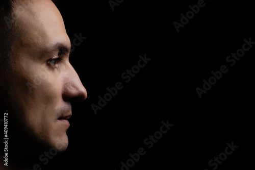 portrait of a man black background