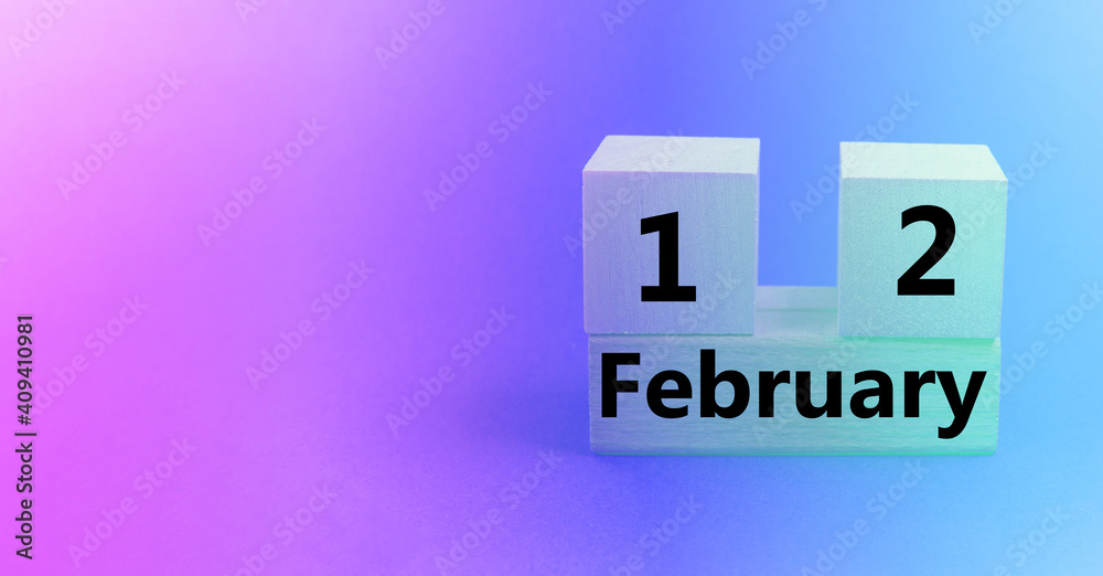 Calendar for February 12 on a wooden cube, gradient pink and purple background, empty space for text, banner Calendar for February 12 on a wooden cube, gradient pink and purple background, empty space for text, banner