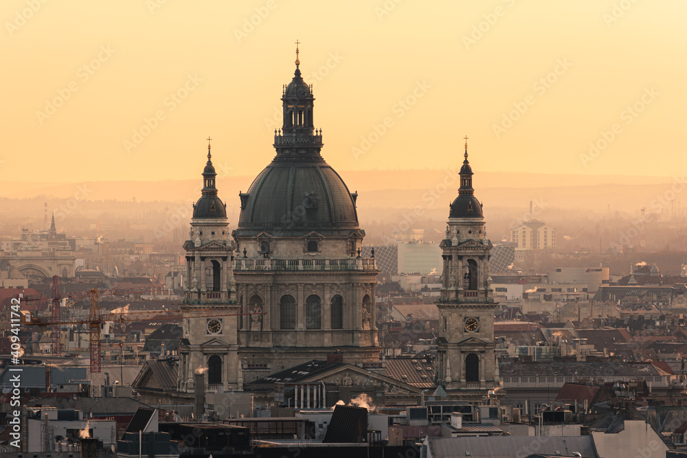 The St Stephen's Basilica and Budapest cityscape at sunrise or sunset in Hungary