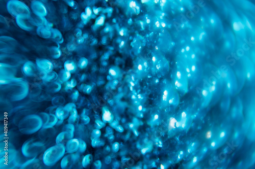 Aqua blue abstract background. Texture bokeh. Defocused image