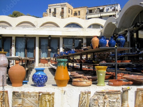 Ceramic dishes sold at the street market in the city of Chania. Traditional Cretan painted ceramic dishes for sale. Chania, Creete, Greece photo