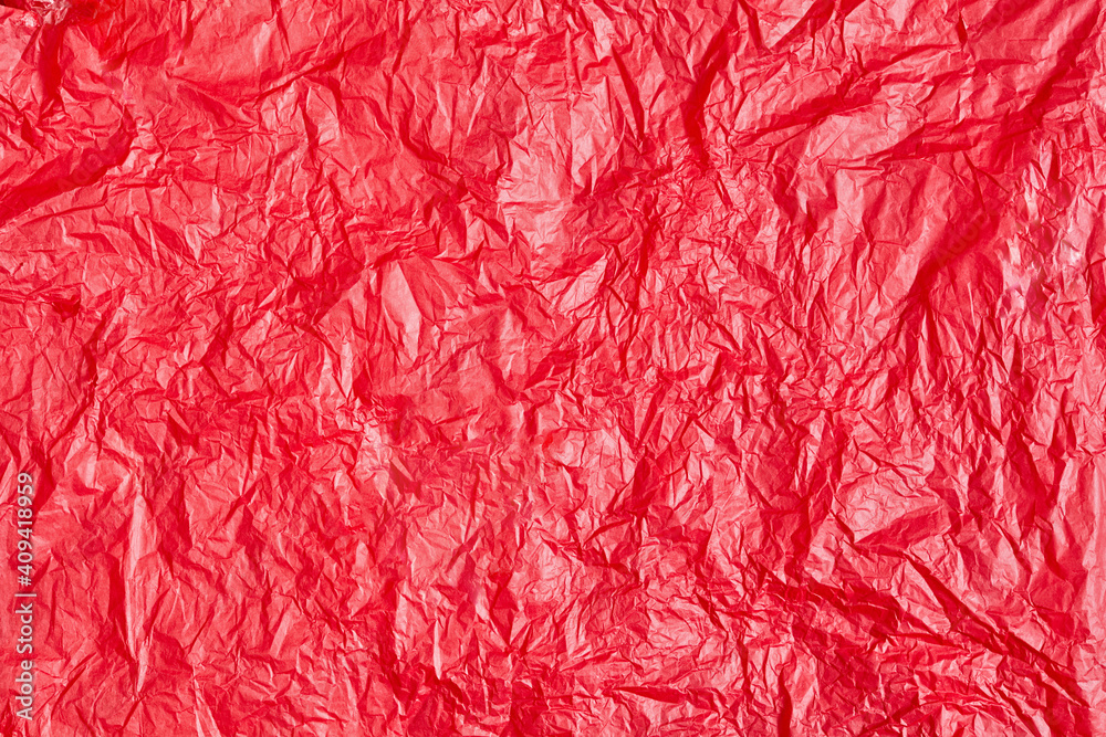 Red crumpled paper or sheet texture background for Design. Wallpaper for text. Copy space. Red crumpled paper or sheet texture background for Design. Wallpaper for text. Copy space.