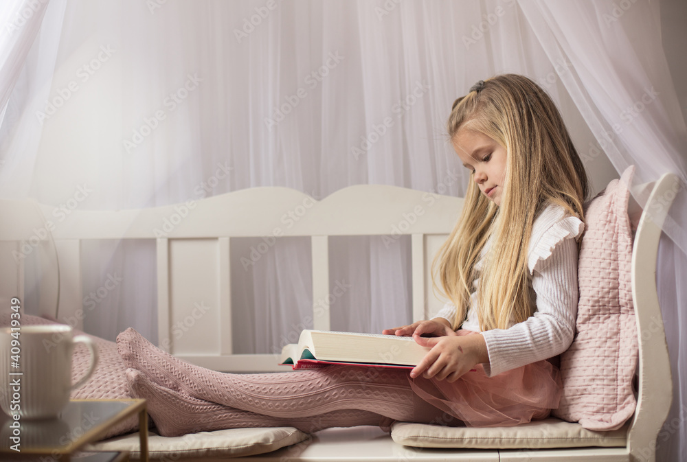 Little girl reading book. Little girl reading book.
