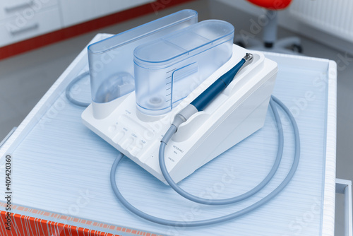 Ultrasonic scaler in the dental office. Dentistry Concept.