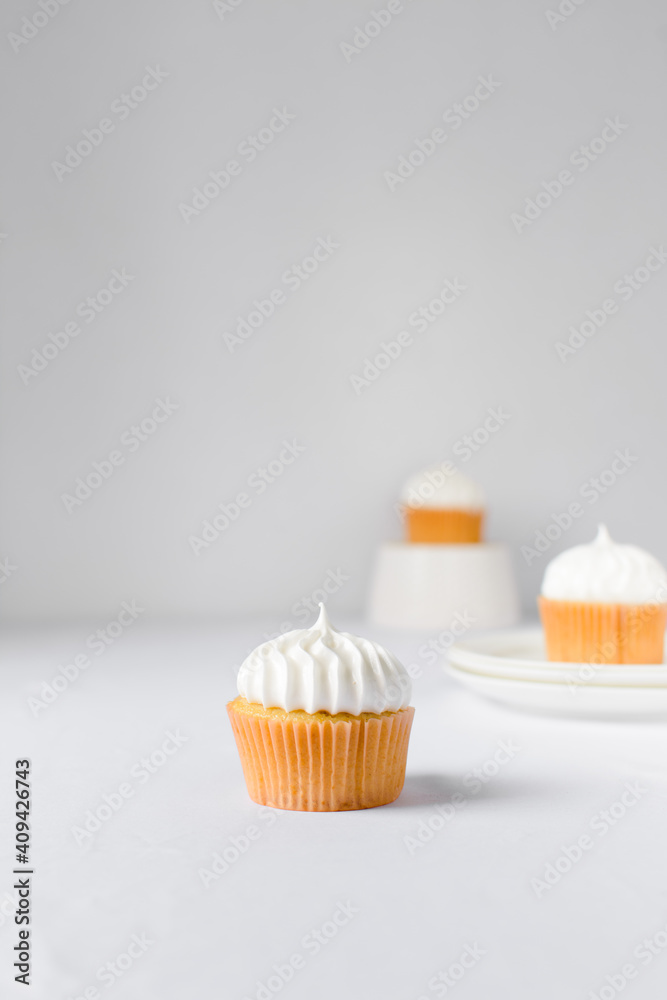 Vanilla Cupcake with a white frosting, Birthday cupcake with white buttercream Vanilla Cupcake with a white frosting, Birthday cupcake with white buttercream
