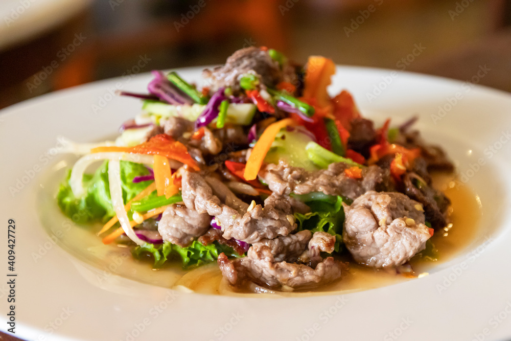 Spicy salad of grilled beef with herb. Spicy salad of grilled beef with herb.
