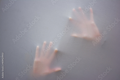 Quadro em tela Handprint of woman as she suffocates behind fabric, raised hands