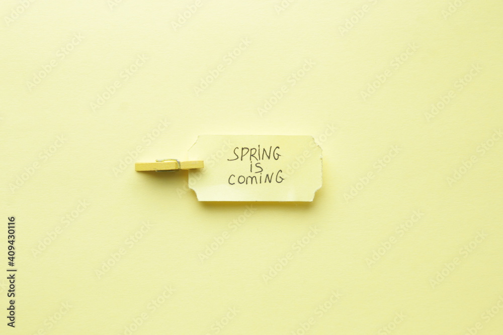 Spring is coming creative concept. Handwriting inscription. Spring is coming creative concept. Handwriting inscription.