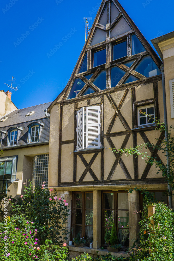 Half timbered house in the streets of Bourges historical center, a medieval city located in the Berry region of France