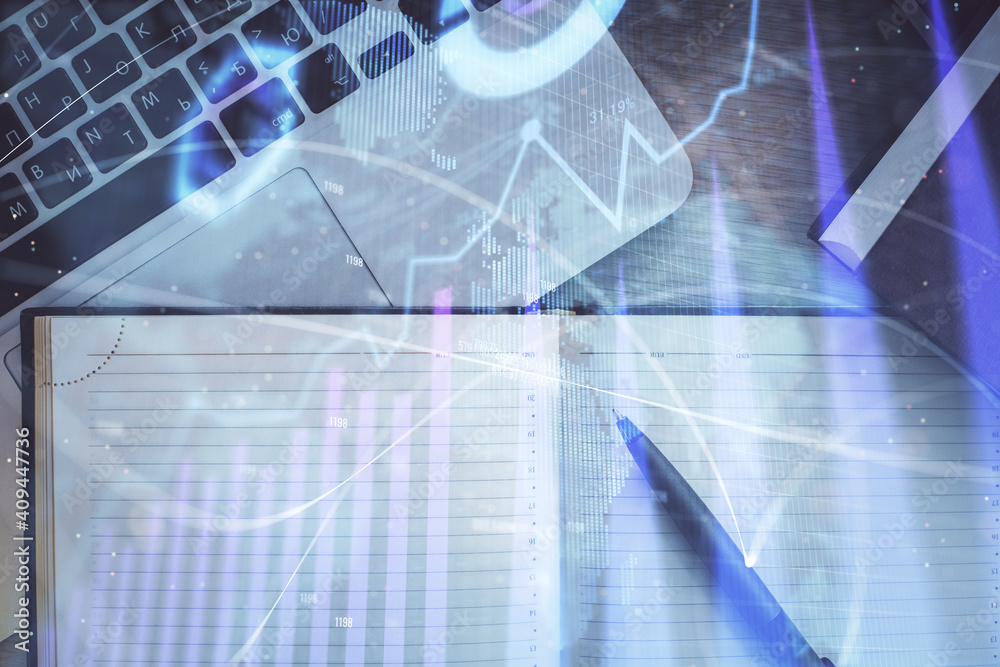 Stock market graph and top view computer on the table background. Multi exposure. Concept of financial education. Stock market graph and top view computer on the table background. Multi exposure. Concept of financial education.