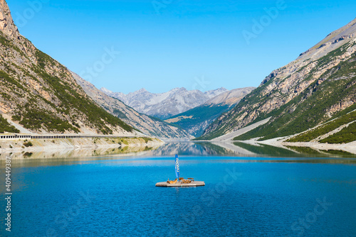 beautiful view of the mountains in the foreground with Lake Livigno in the Italian Alps in the province of Lombardy.