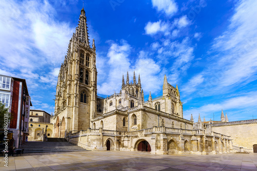Gothic Cathedral of Burgos by day and with cloudy sky. Wide-angle photo.