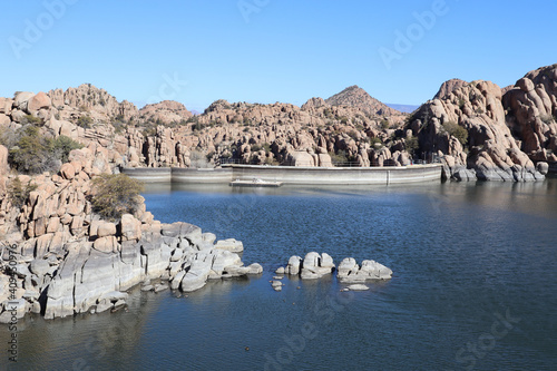 Granite boulders surrounding the shoreline of Watson Lake nearby Prescott, Arizona photo