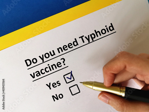 One person is answering question about vaccines. He needs typhoid vaccine.