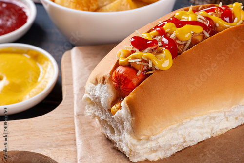 фотографія .Brazilian style hot dog, with mustard, ketchup and potato straw