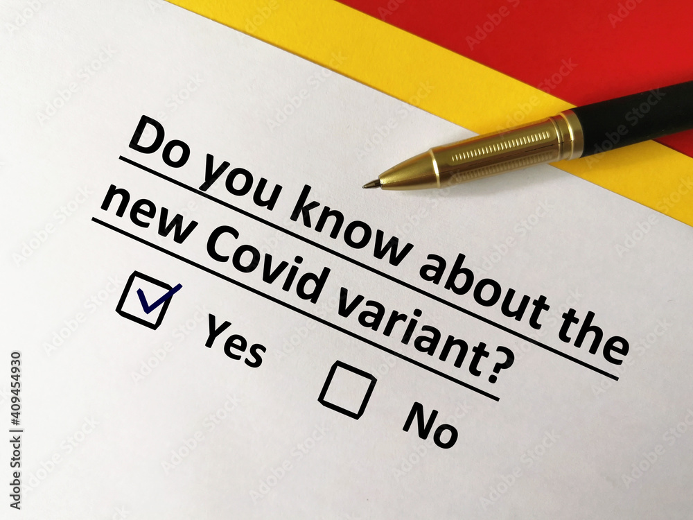 One person is answering question about vaccines. He knows about the new covid variant. One person is answering question about vaccines. He knows about the new covid variant.