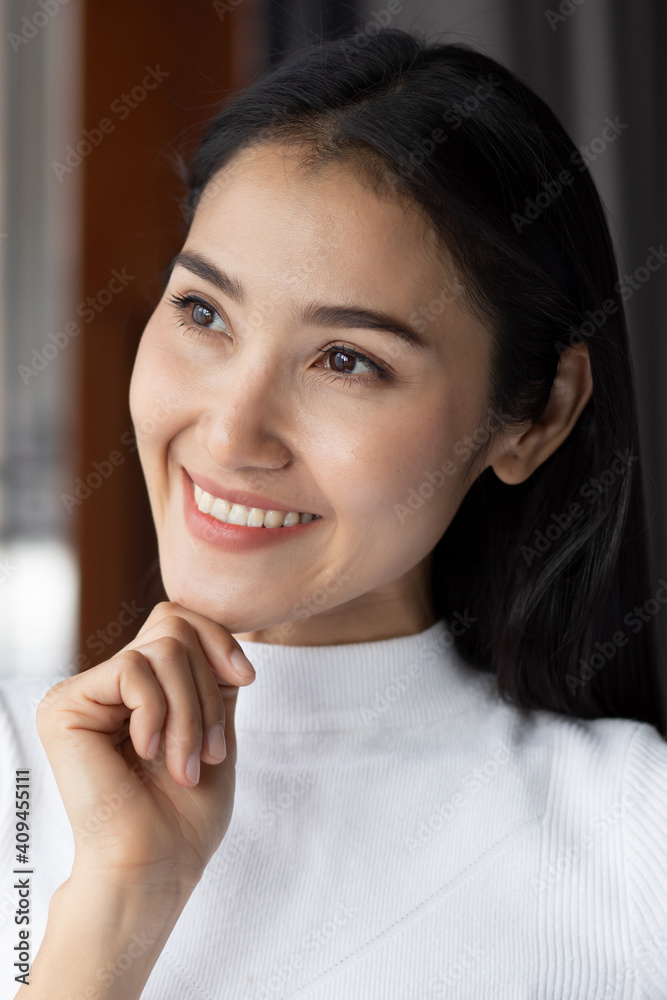 Happy asian woman thinking and planning, portrait of white woman looking up, thinking, finding good idea or decisive plan; adult east asian Chinese woman model Happy asian woman thinking and planning, portrait of white woman looking up, thinking, finding good idea or decisive plan; adult east asian Chinese woman model