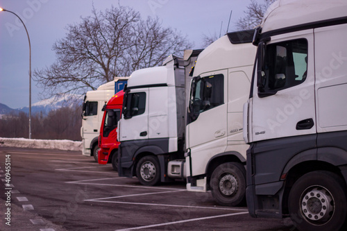 many trucks parked in winter