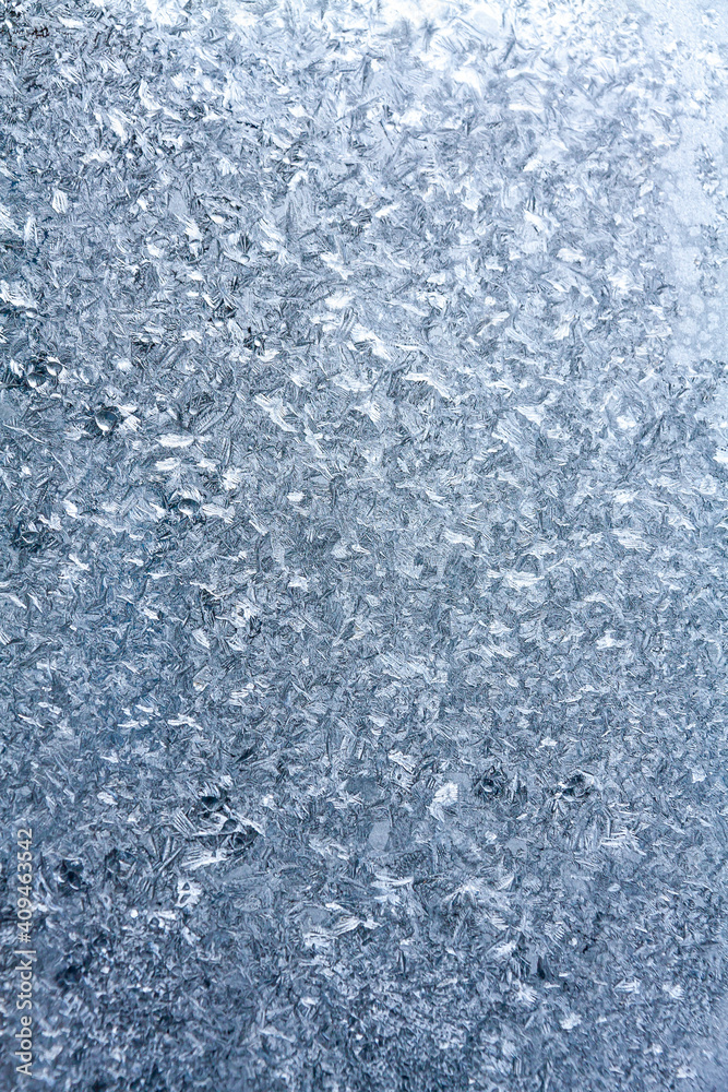 a winter window covered by frost a winter window covered by frost
